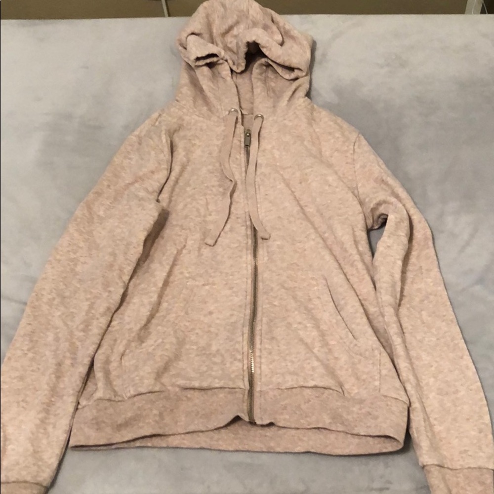 light pink h&m zip up sweatshirt with a hood